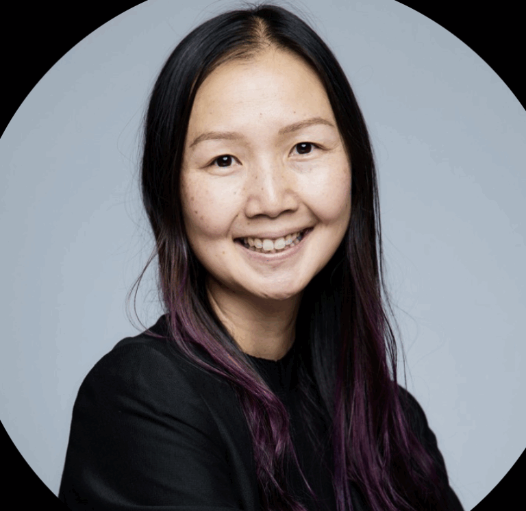 Tiffany chin smiling at the camera