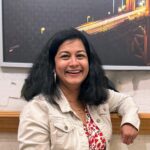 Kavita tipnis-rasal laugghing at the camera