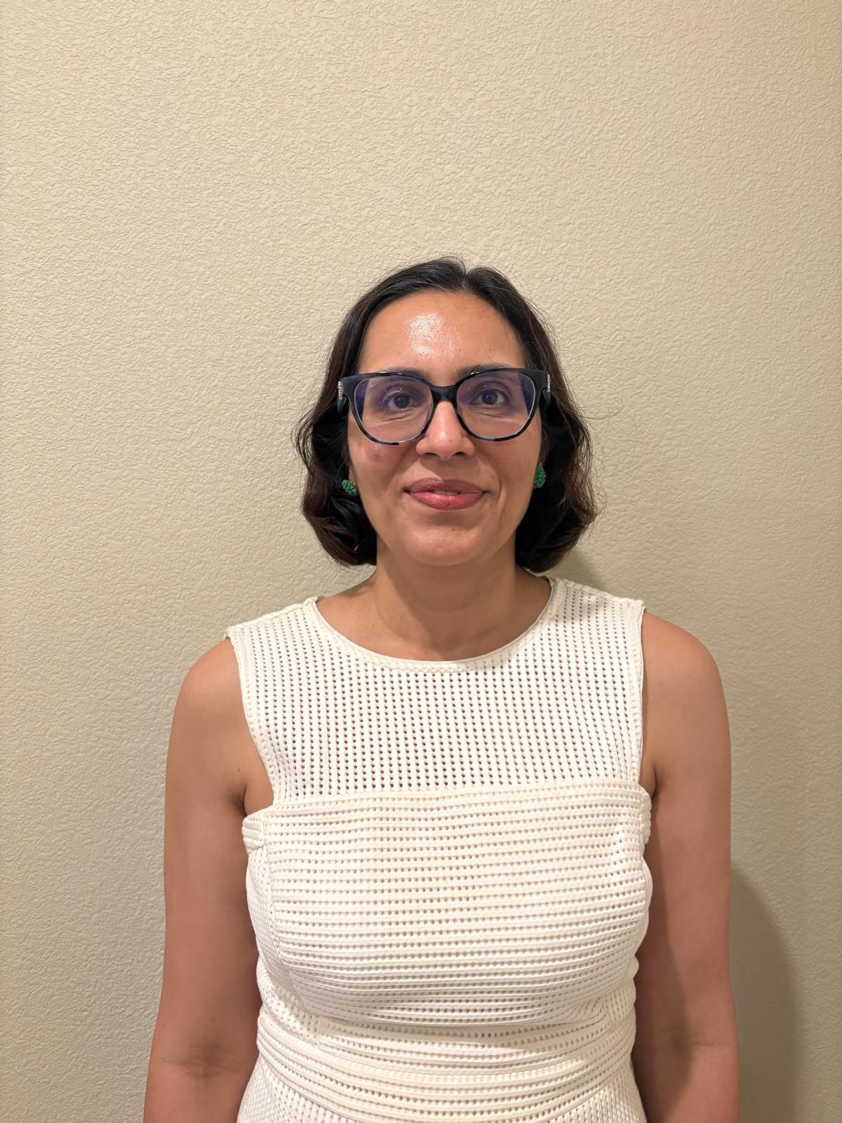 Monisha Shah smiling